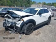 ✅ 2023 Mazda CX-30 Premium • VIN: 3MVDMBDY8PM583652 • Lot: 42221466. Listed on IAAI with 56,845 mi. Free auction sales archive from the USA and detailed vehicle history report at DreamBid. Image 2.