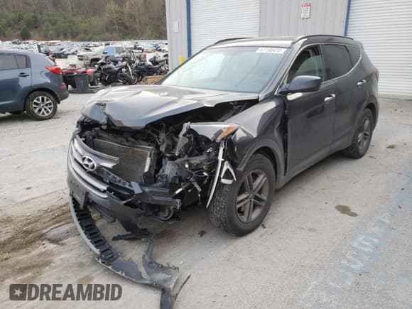 ✅ 2017 Hyundai Santa Fe 2.4L • VIN: 5XYZUDLB4HG488343 • Lot: 67198472. Listed on Copart with Not provided. Free auction sales archive from the USA and detailed vehicle history report at DreamBid. Image 2.