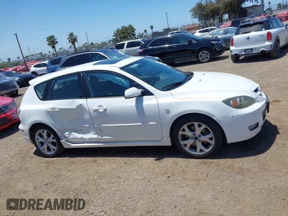 ✅ 2007 Mazda 3 S Touring • VIN: JM1BK344271655377 • Lot: 42272329. Listed on IAAI with 163,044 mi. Free auction sales archive from the USA and detailed vehicle history report at DreamBid. Image 13.