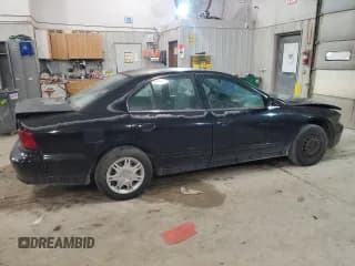 ✅ 2002 Mitsubishi Galant ES • VIN: 4A3AA46G32E114106 • Lot: 64320224. Wystawiony na Copart z przebiegiem 119 403 mil. Bezpłatny archiwum sprzedaży aukcyjnych z USA i szczegółowy raport historii pojazdu na DreamBid. Zdjęcie 3.