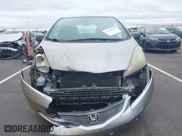 ✅ 2009 Honda Fit • VIN: JHMGE88289S055025 • Lot: 43424630. Wystawiony na IAAI z przebiegiem 319 864 mil. Bezpłatny archiwum sprzedaży aukcyjnych z USA i szczegółowy raport historii pojazdu na DreamBid. Zdjęcie 12.