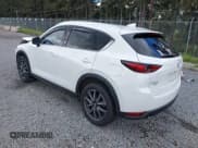 ✅ 2017 Mazda CX-5 Grand Touring • VIN: JM3KFBDL4H0186345 • Лот: 42244493. Опубликован ранее на IAAI с пробегом 58 063 миль. Бесплатный доступ к архиву аукционных продаж из США и подробный отчёт об истории автомобиля на DreamBid. Изображение 3.