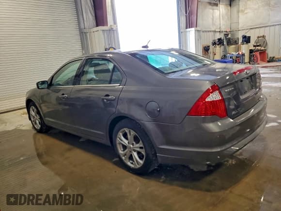 ✅ 2012 Ford Fusion SE • VIN: 3FAHP0HA9CR281396 • Lot: 94140105. Wystawiony na Copart z przebiegiem 171 151 mil. Bezpłatny archiwum sprzedaży aukcyjnych z USA i szczegółowy raport historii pojazdu na DreamBid. Zdjęcie 2.