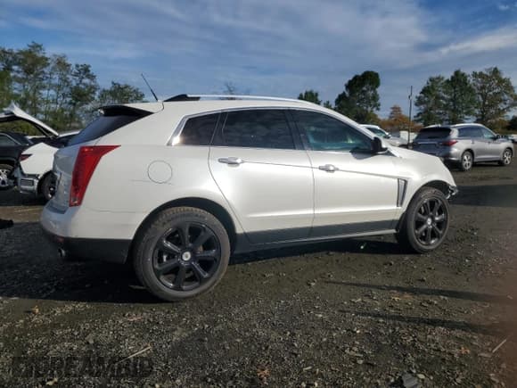 ✅ 2013 Cadillac SRX Premium Collection • VIN: 3GYFNEE32DS533844 • Lot: 86280585. Wystawiony na Copart z przebiegiem 115 438 mil. Bezpłatny archiwum sprzedaży aukcyjnych z USA i szczegółowy raport historii pojazdu na DreamBid. Zdjęcie 3.