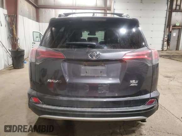 ✅ 2016 Toyota RAV4 XLE • VIN: 2T3RFREV4GW499938 • Lot: 92727755. Listed on Copart with 107,369 mi. Free auction sales archive from the USA and detailed vehicle history report at DreamBid. Image 6.