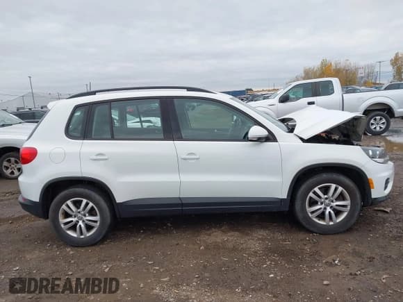 ✅ 2016 Volkswagen Tiguan SEL • VIN: WVGBV7AX1GW525909 • Lot: 43617748. Listed on IAAI with 113,339 mi. Free auction sales archive from the USA and detailed vehicle history report at DreamBid. Image 13.