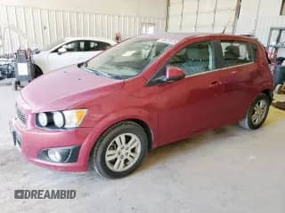 2014 Chevrolet Sonic LT z VIN 1G1JC6SHXE4132404, wystawiony jako Copart lot #65522515 z przebiegiem 86 388 mil mil oraz Szkoda całkowita • Salvage title. Historia ofert i sprzedaży dostępna na DreamBid. Obrazek 1.