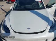 ✅ 2023 Tesla Model Y • VIN: 7SAYGDED4PF931973 • Lot: 43560786. Listed on IAAI with 39,931 mi. Free auction sales archive from the USA and detailed vehicle history report at DreamBid. Image 10.