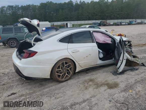 2022 Hyundai Sonata N Line with VIN KMHL14JC2NA233627, listed as a Copart auction lot 83751315 with 45,977 mi miles and Salvage title. Bid and sale history available at DreamBid. Image 3.