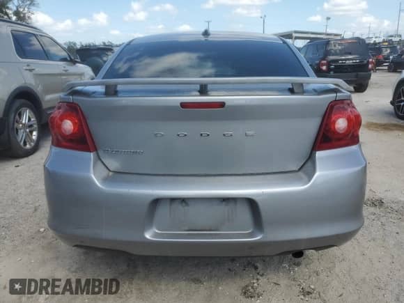 2014 Dodge Avenger SE с VIN 1C3CDZABXEN130419, выставлен на аукционе Copart как лот 74018944 с пробегом 59 928 миль миль и Списание • Salvage title. История ставок и продаж доступна на DreamBid. Изображение 6.