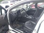 ✅ 2013 Ford Fusion Titanium Hybrid • VIN: 3FA6P0RU6DR315585 • Lot: 42598359. Listed on IAAI with 153,669 mi. Free auction sales archive from the USA and detailed vehicle history report at DreamBid. Image 5.