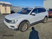 ✅ 2018 Volkswagen Tiguan S • VIN: 3VV0B7AX9JM068361 • Lot: 93914195. Wystawiony na Copart z przebiegiem 285 630 mil. Bezpłatny archiwum sprzedaży aukcyjnych z USA i szczegółowy raport historii pojazdu na DreamBid. Zdjęcie 1.