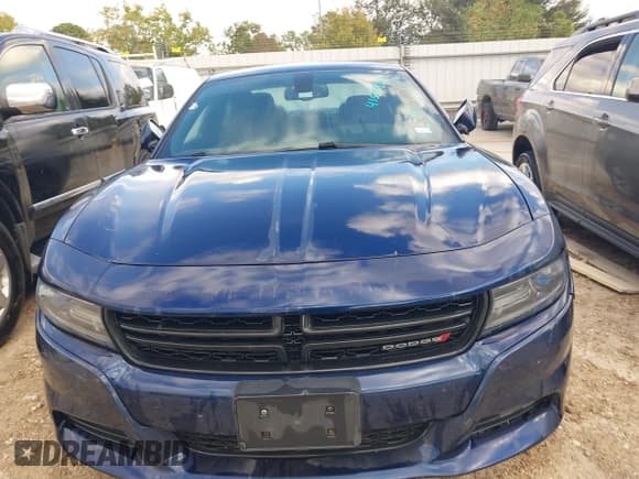 ✅ 2015 Dodge Charger SXT • VIN: 2C3CDXHG3FH878655 • Lot: 43553155. Listed on IAAI with 128,649 mi. Free auction sales archive from the USA and detailed vehicle history report at DreamBid. Image 12.