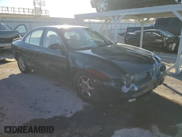 ✅ 2000 Oldsmobile Intrigue GLS • VIN: 1G3WX52H0YF165464 • Lot: 80502684. Wystawiony na Copart z przebiegiem Nie podano. Bezpłatny archiwum sprzedaży aukcyjnych z USA i szczegółowy raport historii pojazdu na DreamBid. Zdjęcie 4.