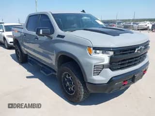 2024 Chevrolet Silverado 1500 LT Trail Boss with VIN 3GCUDFEL7RG174863, listed as a IAAI auction lot 43136773 with 12,714 mi miles and . Bid and sale history available at DreamBid. Image 1.