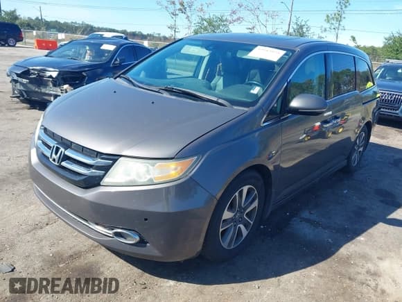 ✅ 2016 Honda Odyssey Touring Elite • VIN: 5FNRL5H9XGB036126 • Lot: 43515975. Wystawiony na IAAI z przebiegiem 156 044 mil. Bezpłatny archiwum sprzedaży aukcyjnych z USA i szczegółowy raport historii pojazdu na DreamBid. Zdjęcie 2.