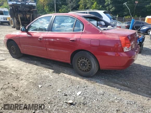 2004 Hyundai Elantra GLS with VIN KMHDN46D44U814635, listed as a Copart auction lot 71633795 with 158,959 mi miles and Salvage title. Bid and sale history available at DreamBid. Image 2.