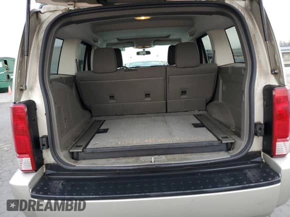 2008 Dodge Nitro SXT с VIN 1D8GT28K18W273997, выставлен на аукционе Copart как лот 82488214 с пробегом 185 077 миль миль и Списание • Salvage title. История ставок и продаж доступна на DreamBid. Изображение 13.