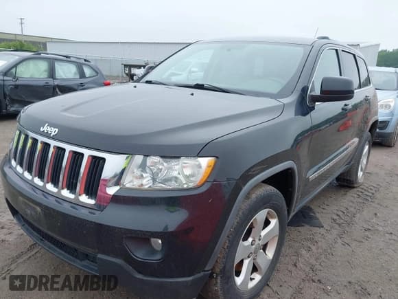 ✅ 2011 Jeep Grand Cherokee Laredo • VIN: 1J4RR4GG3BC505615 • Lot: 42455554. Listed on IAAI with 186,399 mi. Free auction sales archive from the USA and detailed vehicle history report at DreamBid. Image 2.