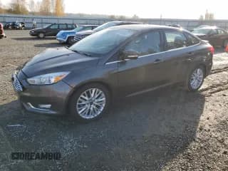 ✅ 2016 Ford Focus Titanium • VIN: 1FADP3J23GL255044 • Lot: 92498805. Wystawiony na Copart z przebiegiem 133 538 mil. Bezpłatny archiwum sprzedaży aukcyjnych z USA i szczegółowy raport historii pojazdu na DreamBid. Zdjęcie 1.