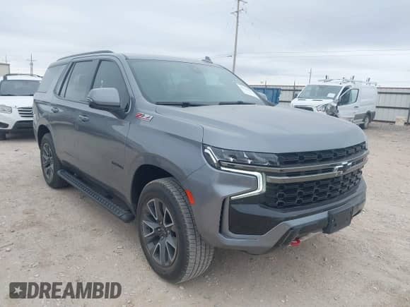 2022 Chevrolet Tahoe Z71 z VIN 1GNSKPKD3NR304672, wystawiony jako IAAI lot #41316391 z przebiegiem 70 380 mil mil oraz . Historia ofert i sprzedaży dostępna na DreamBid. Obrazek 1.