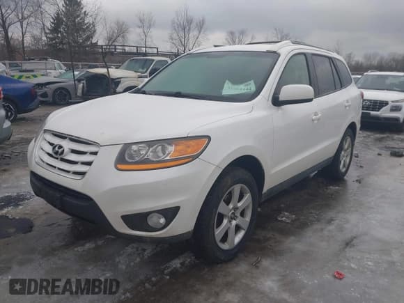 ✅ 2011 Hyundai Santa Fe Limited • VIN: 5XYZHDAGXBG008896 • Lot: 41564444. Listed on IAAI with 122,104 mi. Free auction sales archive from the USA and detailed vehicle history report at DreamBid. Image 17.