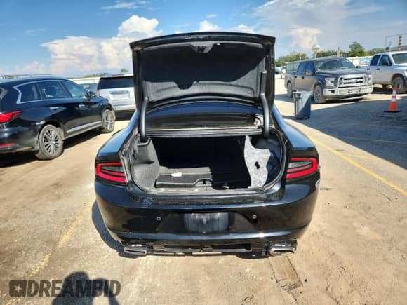 2021 Dodge Charger SXT с VIN 2C3CDXBG4MH642294, выставлен на аукционе Copart как лот 81025785 с пробегом 83 600 миль миль и Списание • Salvage title. История ставок и продаж доступна на DreamBid. Изображение 6.