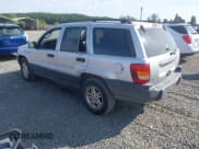 ✅ 2004 Jeep Grand Cherokee Laredo • VIN: 1J4GW48S34C272700 • Lot: 42494918. Listed on IAAI with 214,843 mi. Free auction sales archive from the USA and detailed vehicle history report at DreamBid. Image 3.