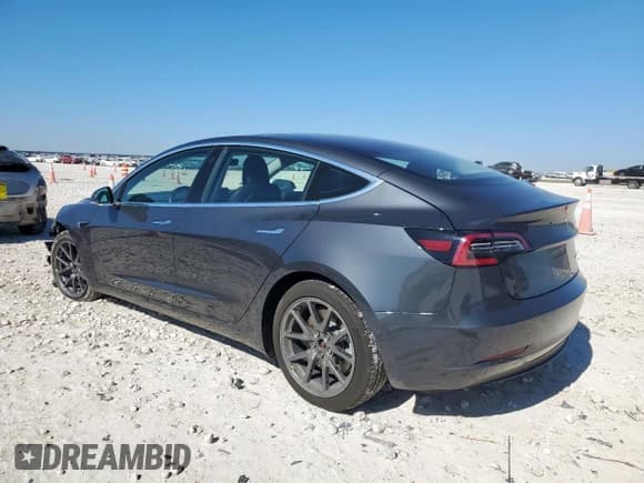 ✅ 2018 Tesla Model 3 Long Range Battery • VIN: 5YJ3E1EBXJF129042 • Lot: 91327865. Listed on Copart with 52,400 mi. Free auction sales archive from the USA and detailed vehicle history report at DreamBid. Image 2.
