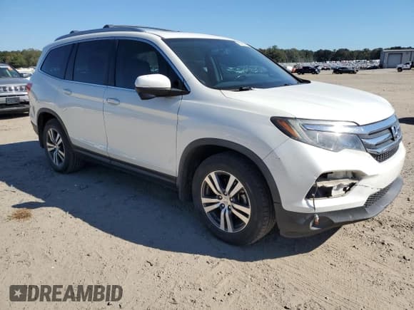 ✅ 2018 Honda Pilot EX-L • VIN: 5FNYF5H51JB032523 • Lot: 86629865. Listed on Copart with 162,765 mi. Free auction sales archive from the USA and detailed vehicle history report at DreamBid. Image 4.