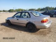 ✅ 2001 Chevrolet Prizm • VIN: 1Y1SK528X1Z411319 • Lot: 56176625. Listed on Copart with 174,618 mi. Free auction sales archive from the USA and detailed vehicle history report at DreamBid. Image 2.