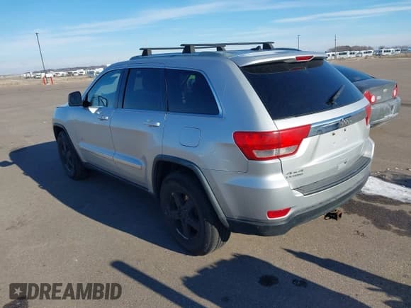 ✅ 2011 Jeep Grand Cherokee Laredo • VIN: 1J4RR4GG6BC589400 • Lot: 43798652. Listed on IAAI with 212,945 mi. Free auction sales archive from the USA and detailed vehicle history report at DreamBid. Image 3.