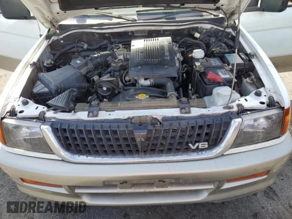 ✅ 1998 Mitsubishi Montero Sport LS • VIN: JA4LS31P1WP029117 • Lot: 72069334. Wystawiony na Copart z przebiegiem 172 069 mil. Bezpłatny archiwum sprzedaży aukcyjnych z USA i szczegółowy raport historii pojazdu na DreamBid. Zdjęcie 12.