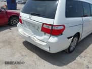 ✅ 2006 Honda Odyssey EX-L • VIN: 5FNRL38716B416425 • Lot: 42766088. Listed on IAAI with 168,178 mi. Free auction sales archive from the USA and detailed vehicle history report at DreamBid. Image 6.