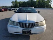 ✅ 1998 Lincoln Town Car Signature • VIN: 1LNFM82W0WY619234 • Lot: 64928345. Listed on Copart with Not provided. Free auction sales archive from the USA and detailed vehicle history report at DreamBid. Image 5.