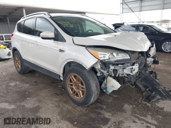 ✅ 2015 Ford Escape Titanium • VIN: 1FMCU0J91FUA27610 • Lot: 42095995. Listed on IAAI with 122,521 mi. Free auction sales archive from the USA and detailed vehicle history report at DreamBid. Image 1.