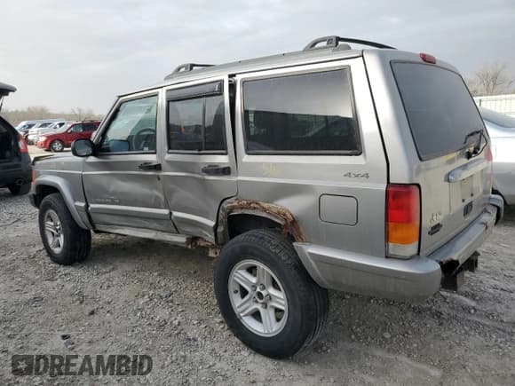 ✅ 2001 Jeep Cherokee Sport • VIN: 1J4FF58SX1L576572 • Lot: 48982965. Listed on Copart with 174,500 mi. Free auction sales archive from the USA and detailed vehicle history report at DreamBid. Image 2.