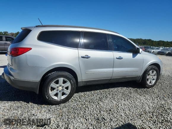 ✅ 2012 Chevrolet Traverse 2LT • VIN: 1GNKRJED9CJ290373 • Lot: 87024035. Wystawiony na Copart z przebiegiem 195 838 mil. Bezpłatny archiwum sprzedaży aukcyjnych z USA i szczegółowy raport historii pojazdu na DreamBid. Zdjęcie 3.