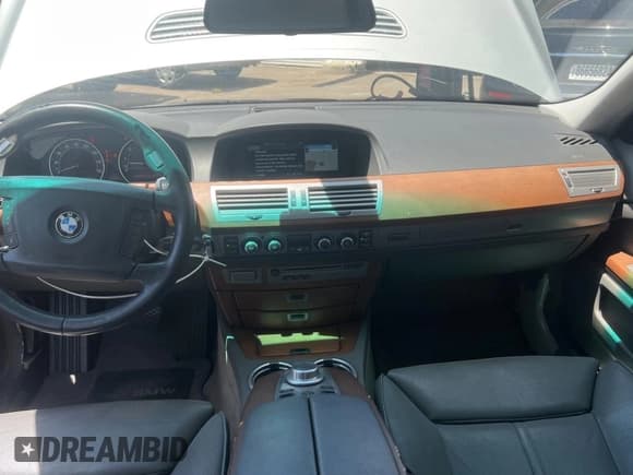 ✅ 2006 BMW 7 Series 750i • VIN: WBAHL83586DT05258 • Лот: 63863055. Опубликован ранее на Copart с пробегом 129 393 миль. Бесплатный доступ к архиву аукционных продаж из США и подробный отчёт об истории автомобиля на DreamBid. Изображение 9.