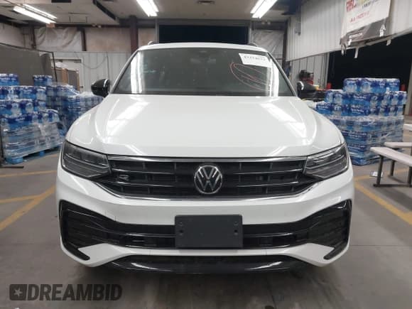 ✅ 2023 Volkswagen Tiguan SE R-Line Black • VIN: 3VVCB7AXXPM005095 • Лот: 43324632. Опубликован ранее на IAAI с пробегом 22 484 миль. Бесплатный доступ к архиву аукционных продаж из США и подробный отчёт об истории автомобиля на DreamBid. Изображение 12.