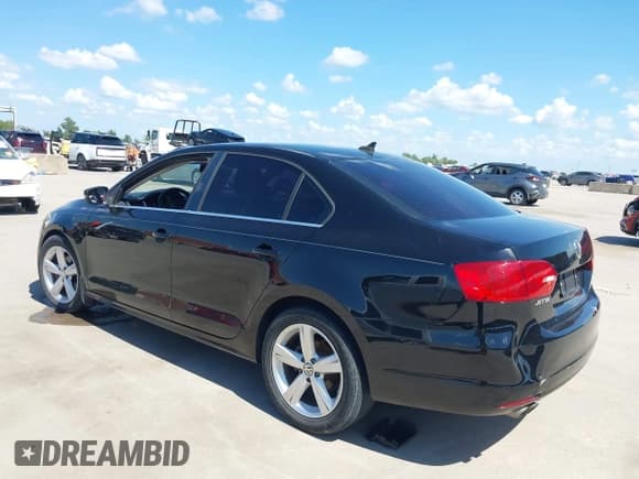 ✅ 2012 Volkswagen Jetta TDI w/Premium & Nav • VIN: 3VWLL7AJ0CM410008 • Lot: 43011566. Listed on IAAI with 207,018 mi. Free auction sales archive from the USA and detailed vehicle history report at DreamBid. Image 3.