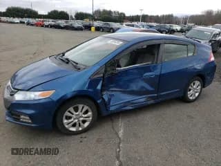 ✅ 2014 Honda Insight EX • VIN: JHMZE2H71ES002291 • Лот: 74723024. Опубликован ранее на Copart с пробегом 67 071 миль. Бесплатный доступ к архиву аукционных продаж из США и подробный отчёт об истории автомобиля на DreamBid. Изображение 1.