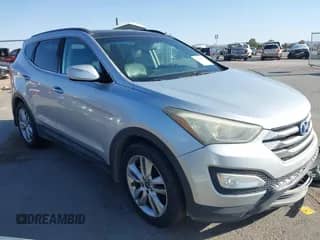 2015 Hyundai Santa Fe z VIN 5XYZWDLA8FG255743, wystawiony jako IAAI lot #42014071 z przebiegiem 168 897 mil mil oraz . Historia ofert i sprzedaży dostępna na DreamBid. Obrazek 1.