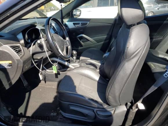 2016 Hyundai Veloster с VIN KMHTC6AD6GU252987, выставлен на аукционе Copart как лот 75444574 с пробегом 69 929 миль миль и Списание • Salvage title. История ставок и продаж доступна на DreamBid. Изображение 7.