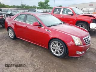 ✅ 2013 Cadillac CTS Performance • VIN: 1G6DK5E3XD0117945 • Lot: 42341416. Listed on IAAI with 67,428 mi. Free auction sales archive from the USA and detailed vehicle history report at DreamBid. Image 1.