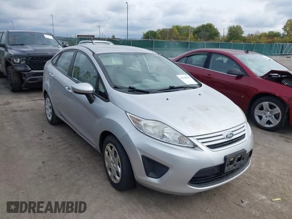 ✅ 2013 Ford Fiesta S • VIN: 3FADP4AJ9DM153299 • Lot: 43444639. Listed on IAAI with 87,877 mi. Free auction sales archive from the USA and detailed vehicle history report at DreamBid. Image 1.