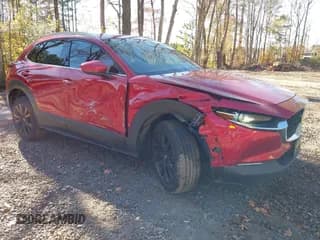 ✅ 2021 Mazda CX-30 Premium • VIN: 3MVDMADL5MM200440 • Lot: 43680245. Wystawiony na IAAI z przebiegiem 82 977 mil. Bezpłatny archiwum sprzedaży aukcyjnych z USA i szczegółowy raport historii pojazdu na DreamBid. Zdjęcie 1.