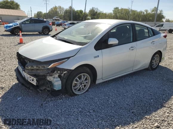 ✅ 2021 Toyota Prius Limited • VIN: JTDKAMFP1M3180918 • Лот: 84627045. Опубликован ранее на Copart с пробегом 65 570 миль. Бесплатный доступ к архиву аукционных продаж из США и подробный отчёт об истории автомобиля на DreamBid. Изображение 1.