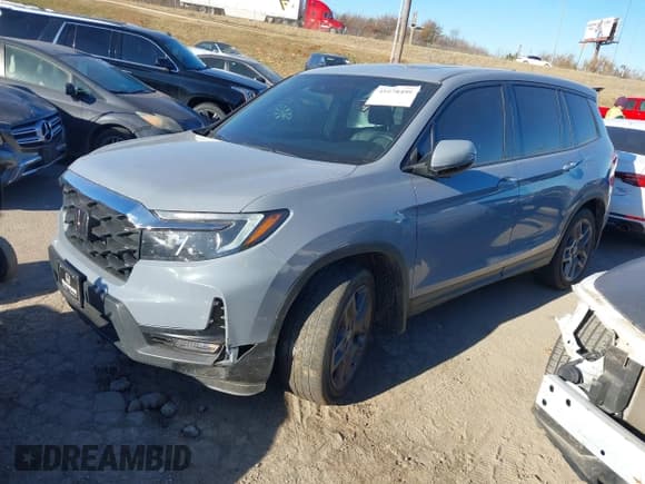 ✅ 2022 Honda Passport EX-L • VIN: 5FNYF7H57NB005716 • Lot: 41078499. Listed on IAAI with 33,141 mi. Free auction sales archive from the USA and detailed vehicle history report at DreamBid. Image 2.