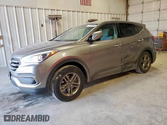 2018 Hyundai Santa Fe 2.4L with VIN 5NMZT3LB0JH081208, listed as a Copart auction lot 71311505 with 147,017 mi miles and Salvage title. Bid and sale history available at DreamBid. Image 1.